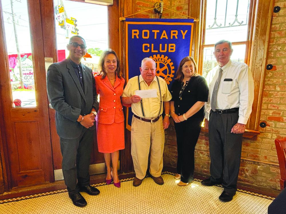 LSUE UPDATES GIVEN -  Shown, from left, are Rotary President Brian Ardoin, LSUE Chancellor Nancee Sorenson, Rotarian Dr. Willie Buller, LSUE Associate Vice Chancellor Carey Lawson and Rotarian Bill Brunet. (Gazette photo by Heather Bogard)