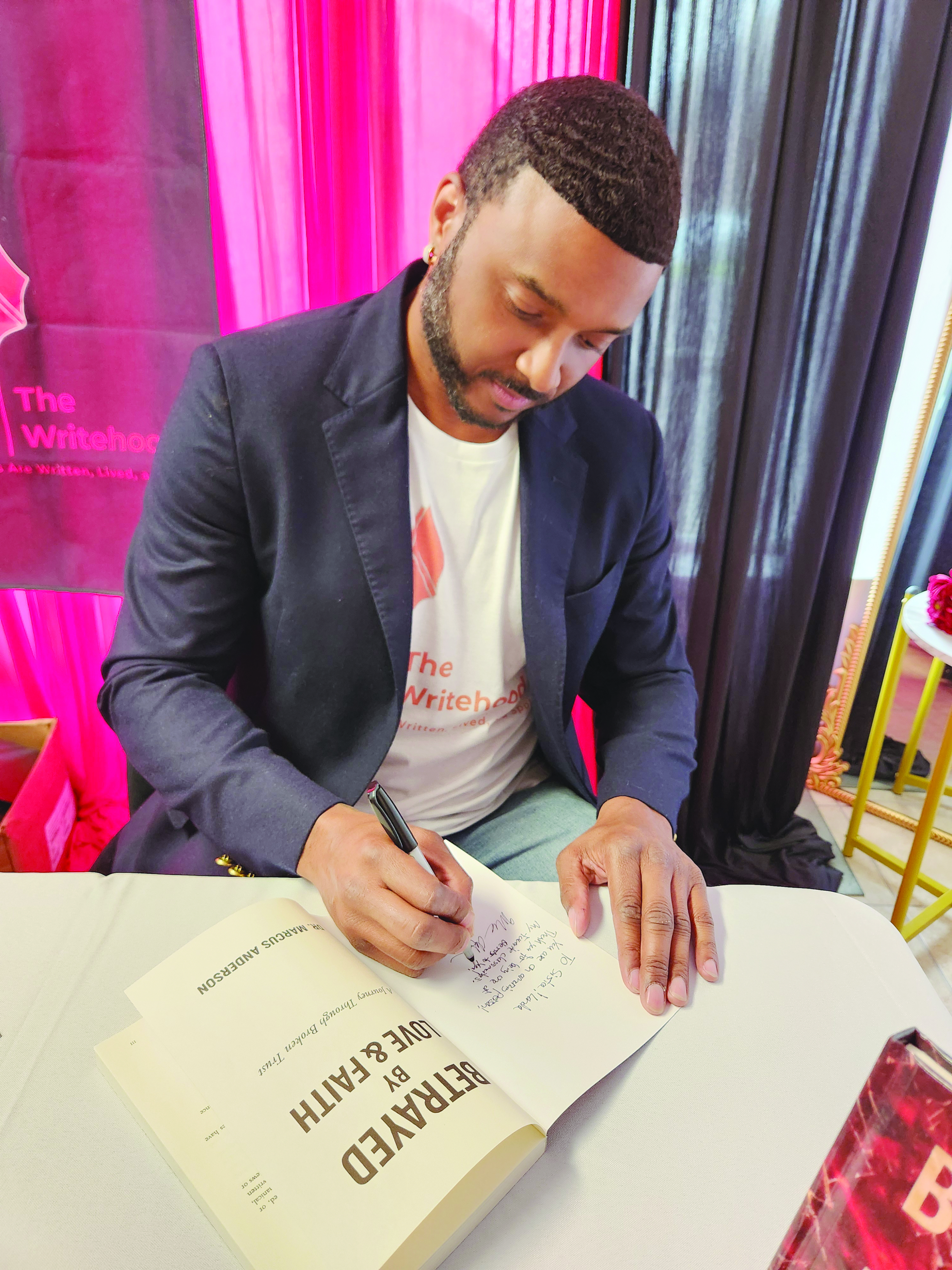 Book signing is held