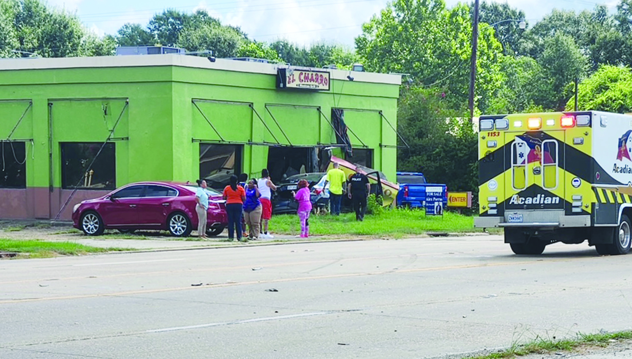 Car runs into vacant building