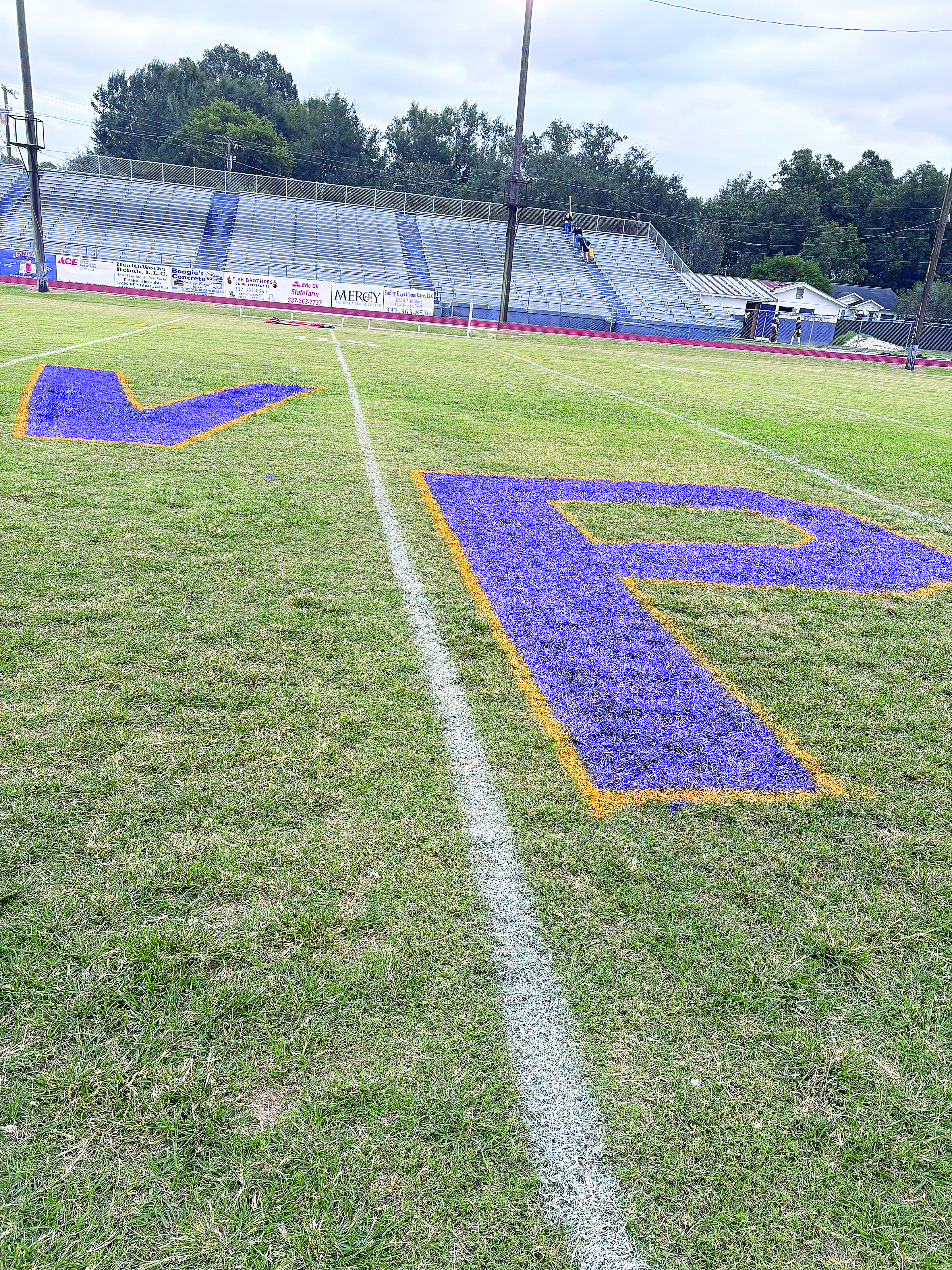 Pictured are a purple “V’ and “P” that were painted at midfield for the Ville Platte High homecoming game against Church Point. The game was interrupted and cancelled because of gun shots. (Gazette photo by Tony Marks)
