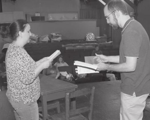 Kristi Burleigh, left, and Nathaniel Clark rehearse lines from “Aboveboard,” a play schedule to be staged in June at the Eunice Players’ Theatre. The production is the first for the Eunice Players’ since the theater was shutdown by COVID-19. (LSN photo by Harlan Kirgan)