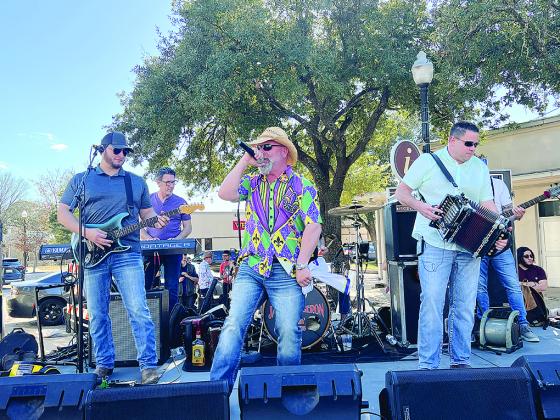 Pictured are Jamie Bergeron and the Kickin’ Cajuns as they perform at the corner of Main Street and Pine Street in Bastrop, Texas, on Saturday, February 3. (Gazette photo by Tony Marks)