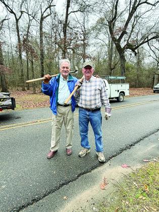 Rotarians Dr. William “Tojo” Ward (left) and Brent Coreil (right) are pictured with their shovels as they work at Chicot State Park on Tuesday, January 23. (Gazette photo by Heather Bogard)
