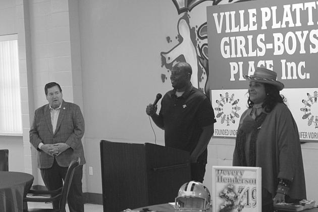 Former LSU and New Orleans Saints receiver Devery Henderson (center) spoke to the Ville Platte Girls-Boys Place Friday. Henderson touched on the importance of positive influences, hard work and interacted with the children while accompanying Louisiana Lt. Gov. Billy Nungesser (left). Also pictured is Ville Platte Mayor Jennifer Vidrine (right). (Gazette photo by Rhett Manuel)