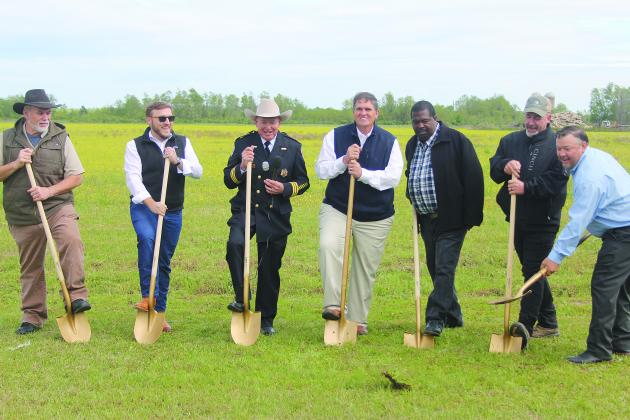 From left are Evangeline Parish Police Juror Eric Soileau, architect Alex Deshotels, Evangeline Parish Sheriff Charles Guillory, and Evangeline Parish Police Jurors Kevin Veillon, Daniel Arvie, Keith Saucier, and Bryan Vidrine as they ceremonially break ground at the site of the parish jail at the Industrial Park. (Gazette photo by Tony Marks)