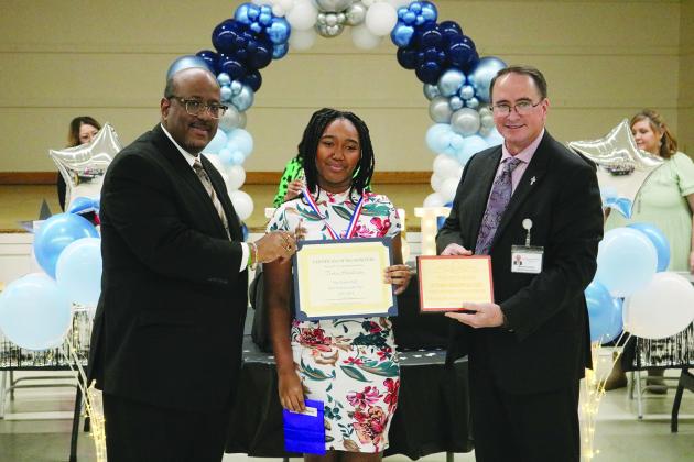 From left are Superintendent Lazard, PPHS 10th grade JAG student of the year Tiara Hutchinson, and Assistant Superintendent Lombas.