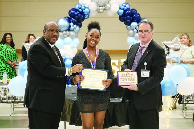 From left are Superintendent Lazard, ERA 7th grade JAG student of the year Tiana McClendon, and Assistant Superintendent Lombas.
