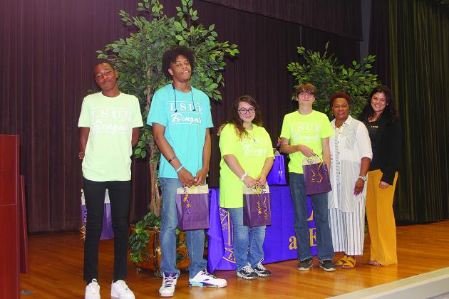 From left are highest performers Javion Leday and Raymond Arvie, most improved Christian Keenum, MVP Brice Vidrine, Ville Platte High School JAG coordinator Dianne Johnson, and LSUE Director of Workforce Innovation and Continuing Education Layce Hamilton. (Gazette photo by Tony Marks)