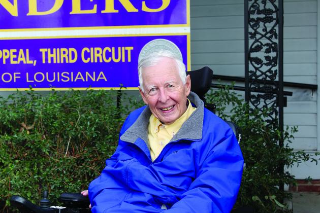 Third Circuit Court of Appeal Judge John Saunders is pictured sitting in front of his Ville Platte law office. The long time public servant passed away on Monday, September 13, at the age of 78, and was nearing the end of his third term on the bench. (Gazette file photo)