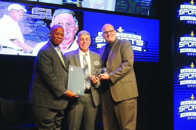 From left are State Senator Gerald Boudreaux, Louisiana Sports Hall of Fame Inductee Claney Duplechin, and Louisiana Sports Writers Association President Raymond Partsch III. (Gazette photo by Tony Marks)