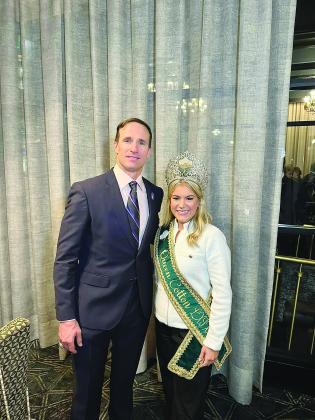 Queen Cotton Amelia Mickal is pictured with former New Orleans Saints Quarterback Drew Brees (right photo). Brees served as king of this year’s Washington Mardi Gras and will be among the Louisiana Sports Hall of Fame inductees later this year. (Photos courtesy of Tim Mickal) 