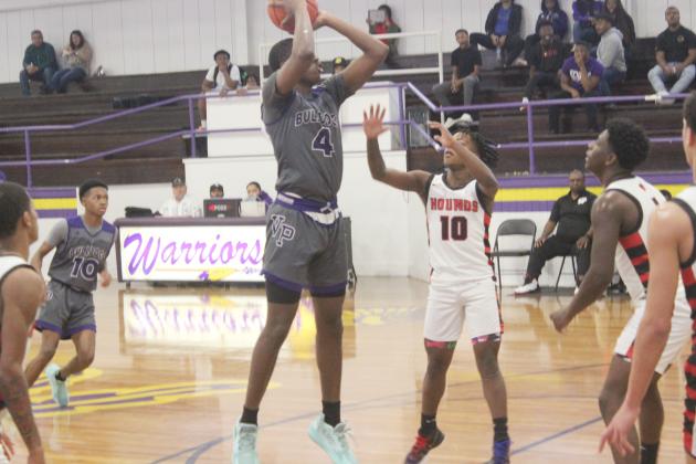 Montavis Seraille (4) attempts a basket for his Ville Platte Bulldogs against the Welsh Greyhounds on the third day of Oakdale’s New Year Tip-Off Presented by RoyOMartin, which was held back in January. (Gazette photo by Rhett Manuel)