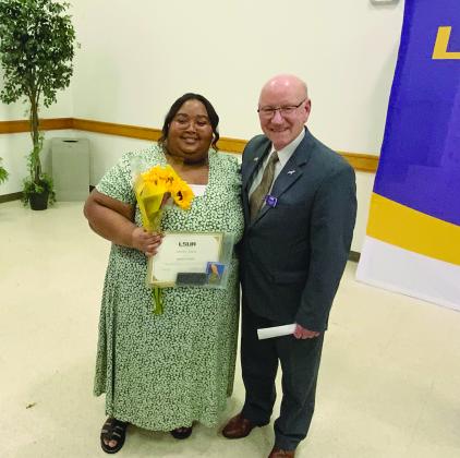Madisyn Nelson (on the left) is pictured with Dr. Paul Coreil Chancellor of LSUA (on the right). (Photo courtesy of Madisyn Nelson)