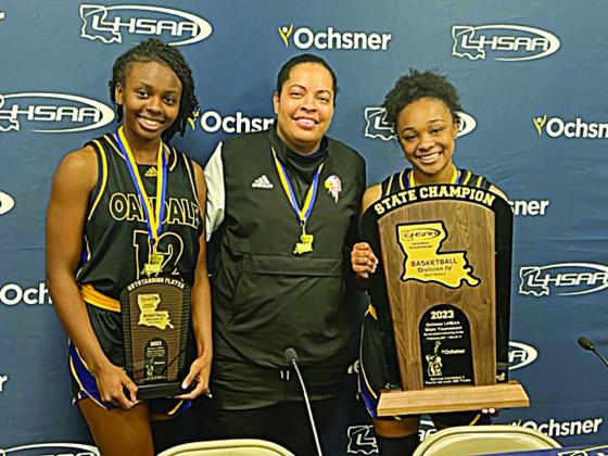 From left are Most Outstanding Player Emani Young, Oakdale girls basketball head coach and Ville Platte native Renotta Edwards, and Kaylee Bradley. (LSN photo by Tony Marks)