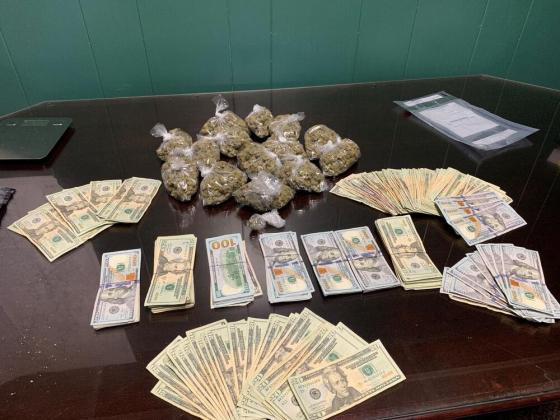 Pictured are marijuana, baggies, and U.S. currency seized during an execution of a search warrant performed by a joint operation among the Evangeline Parish Sheriff’s Office Narcotics Unit and Patrol Unit and the Louisiana Department of Probation and Parole. (Photo courtesy of EPSO)