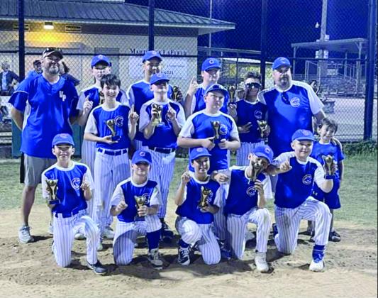 The Cubs won the city championship in the Majors division of Ville Platte Dixie Youth. Pictured with their coaches Nicholas Fontenot and Tibby Figueiredo are team members Jax Fontenot, Brecken Figueiredo, Liam Vidrine, Landon Fontenot, Gage Berard, Dietrich Lavan Jr., Andre Morein, Brant Lejeune, Rhett Guillory, Noah Nicks, Nicholas Soileau, and Brayden McClaskey.  (Photo courtesy of Nicholas Fontenot)