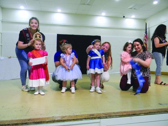 TINY MISS COURT - Shown, from left, are the members of the Tiny Miss Viande Boucanèe Court. They are Queen Oakley Airhart; Olivia Elizabeth Rose Carrier, first runner-up; Rainee Lynn Johnson, second runner-up; and Demi Herboldsheimer, third runner-up.