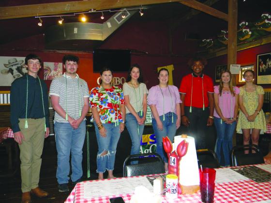 SENIORS RECEIVE HONOR CORDS - Graduating senior 4-H club members in attendance received their honor cords during the annual 4-H Awards Banquet held Tuesday, May 10, at the Crawfish Barn. Shown, from left, are Benjamin Fontenot, Cameron Vizinat, Josi Soileau, Olivia Mayeaux, Lillian Guillory, Jordan Edwards, Emily Deshotel and Madison Courville. (Gazette photos by Heather Bogard)