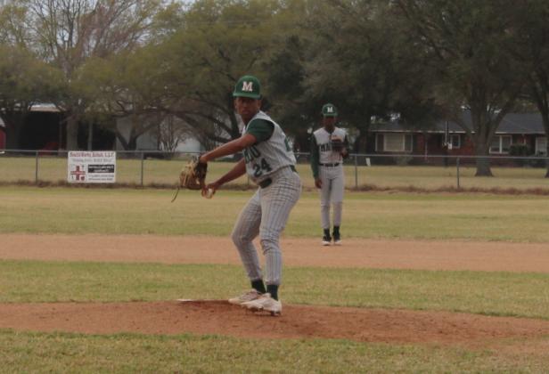 Donovyn Beau Henderson (24) delivers a pitch for Mamou in a loss to Ville Platte High. (Gazette photo by Rhett Manuel)