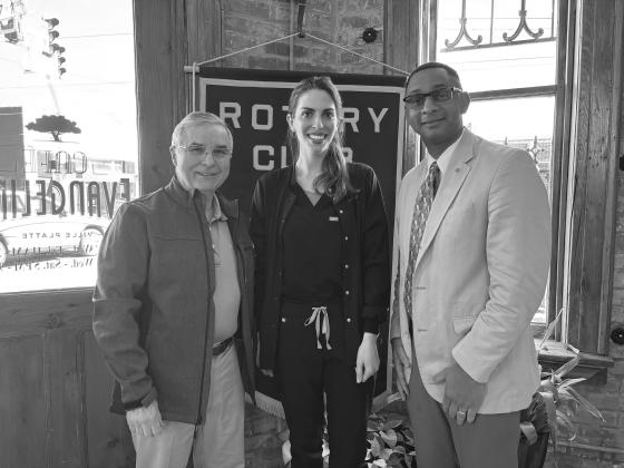 Shown, from left, are Rotarian Dr. Kirk Soileau, Natalie Turk and Rotary President Brian Ardoin. Turk spoke about her experience as a dental hygienist working for Dr. Soileau for the past three and a half years. (Gazette photo by Heather Bogard).