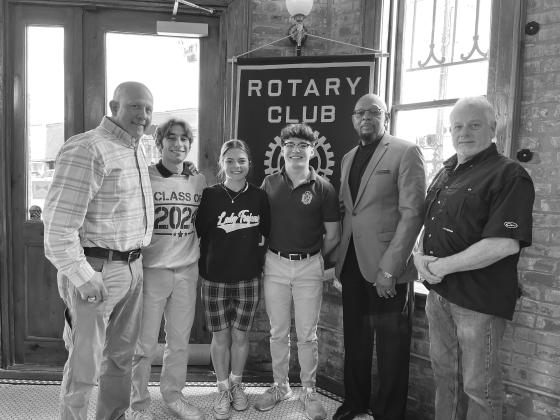 VP ROTARY HEARS FROM SHS POWER LIFTING TEAM - Coach Dwayne Urbina and members of the Sacred Heart High School power lifting team visited the February 7, meeting of the Ville Platte Rotary Club. Shown, from left, are Coach Urbina, Jesse Johnson, Adeline Launey, Jude Hebert, Rotarian Clem Lafleur and Rotary President Larry Lachney (right). (Gazette photo by Heather Bogard)
