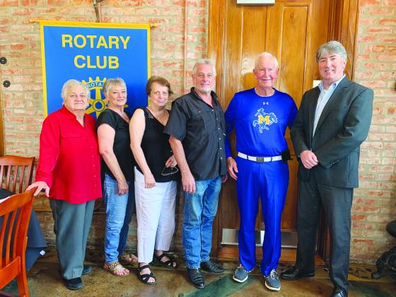 VP ROTARY WELCOMES SPEAKER - Coach Barney Bridges, second from right, was the guest speaker for the July 27, meeting of the Ville Platte Rotary Club. He is shown with, from left, family members Julia Ortego, Debbie Guillory, Georgie Vidrine, board member Larry Lachney and Rotary President Jimmy LeBlanc. (Gazette photos by Heather Bogard)