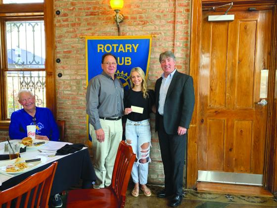 VP ROTARY PRESENTS SCHOLARSHIP - Catherine Fontenot was presented with the RYLA scholarship during the July 27, meeting of the Ville Platte Rotary Club. She is shown with board member Wayne Vidrine, left, and Rotary President Jimmy LeBlanc, right. 
