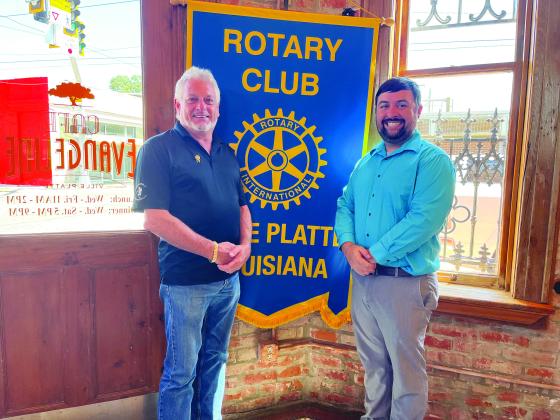 MID-TERM ELECTIONS DISCUSSED - Rotarian Beau Wilson, right, addressed his fellow club members with an update on the upcoming mid-term elections during the meeting held September 13. He is showm with Rotary President Larry Lachney. (Gazette photo by Heather Bogard)