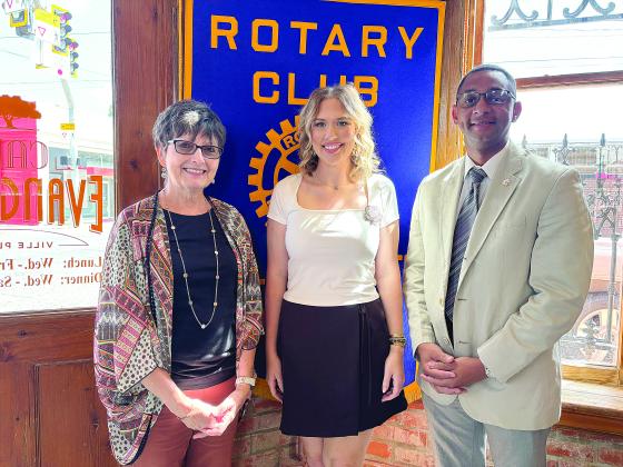 CALHOUN TALKS COTTON FESTIVAL - Katelyn Yates Calhoun (center) was the guest speaker for the October 3, meeting of the Ville Platte Rotary Club. She is shown with Rotarian Annette Johnson (left) and Rotary President Brian Ardoin. (Gazette photo by Heather Bogard)