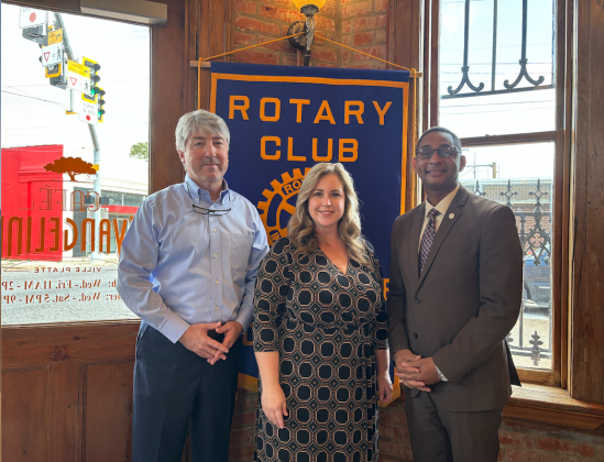STATE ISSUES DISCUSSED - Dr. Erin Bendily with the Pelican Policy Institute for Public Policy (center) was the guest speaker for the November 7, meeting of the Ville Platte Rotary Club. She is shown with Rotarian Jimmy LeBlanc (left) and Rotary President Brian Ardoin. (Gazette photo by Heather Bogard)