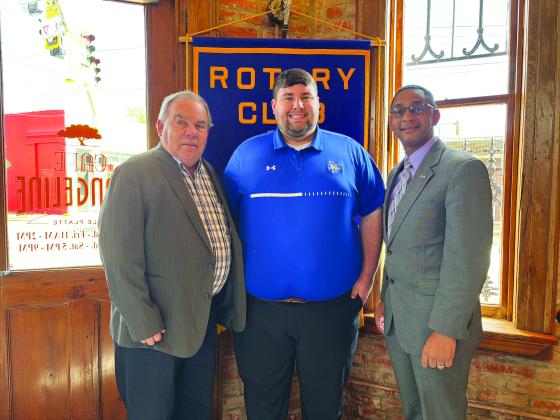 Sam Gil (center) addressed the December 19, meeting of the Ville Platte Rotary Club. He is shown with Rotarian Steve Phillips (left) and Rotary Club President Brian Ardoin. (Gazette photo by Heather Bogard).