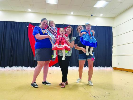 TODDLER MISS TOURNOI COURT - Shown, from left, are the members of the Toddler Miss Tournoi Court. They are Queen Logynn Woods; Alina Ortego, first runner-up; and Bryer Benoit, second runner-up.