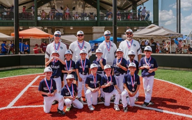 The Ville Platte 7-U Coach Pitch All-Stars, who also competed in the Dixie Youth Region III World Series in Monroe, are pictured with their coaches. In no particular order are Jacques Fontenot, Corbin Haller, Connor LaFleur, Owen Prudhomme, Hudson Deville, Khayden Serialle, Garic Addington, Owen Veillon, Patrick LaHaye, Daniel Rider, Max Miller, and Kharter Serialle.