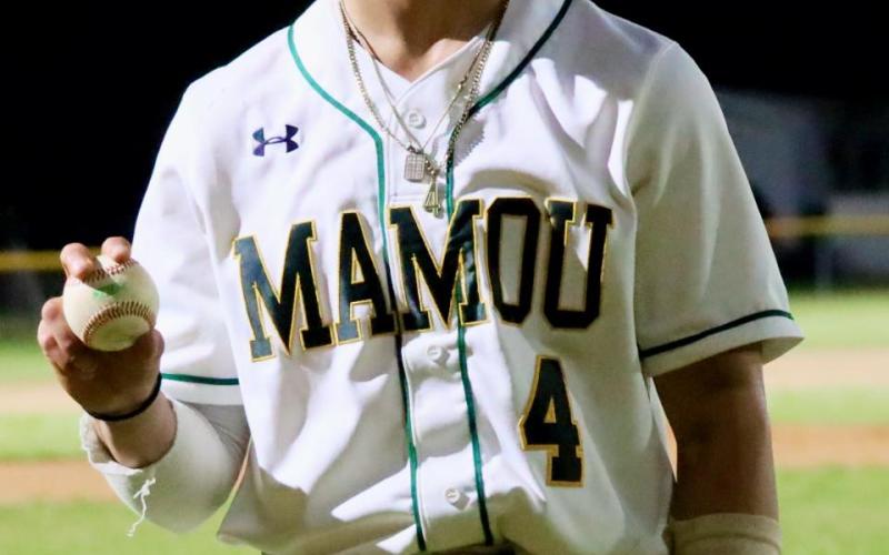 Devin Ardoin is pictured with his grand slam home run ball. (Photo courtesy of MHS Green Demon Baseball)