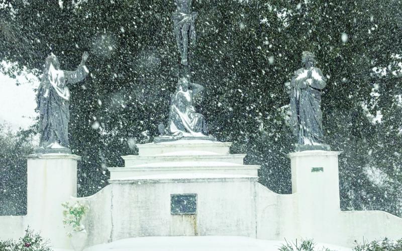 According to reports, a record eight inches of snow blanketed Evangeline Parish. The snowfall amount exceeded the previous record which was set in 1895. In the photo on the left is the Crucifixion statue inside the cemetery at Sacred Heart of Jesus Catholic Church as the snow continues to heavily fall on Tuesday, January 21.