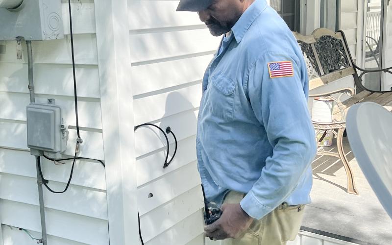Ville Platte Chief of Police Al Perry Thomas inspects a residence on the 600 block of East Washington Street. (Gazette photo by Tony Marks)