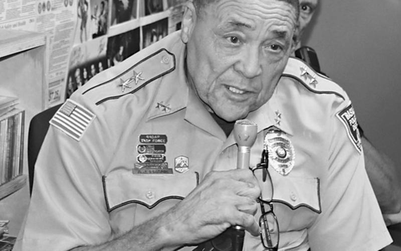 A. J. Frank, assistant police chief for the Town of Basile, speaks during a local law enforcement call-in show program on KVPI radio in Ville Platte. (KVPI Photo)