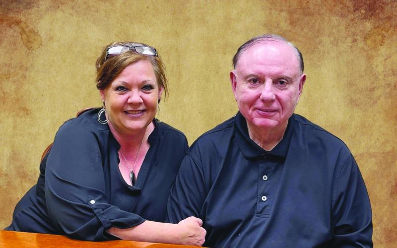 Pictured are on the left is Connie Lamke, president and founder of The Acosta Foundation; and on the right is Dr. Chuck Aswell III. (Photo courtesy of Connie Lamke)