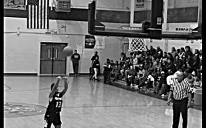 Kameron Allen shoots a basket from beyond the arc in a game played at Ville Platte High School. (Photo submitted)