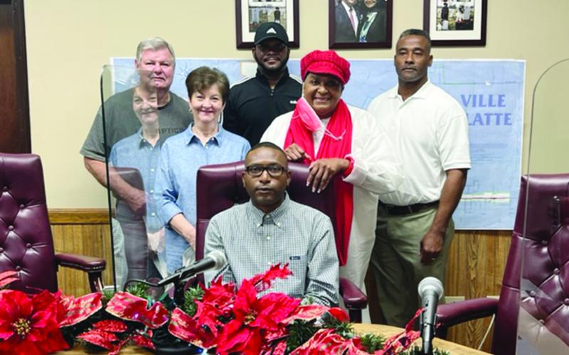 Pictured from left are: back row- Councilman Mike Perron, Councilman Bryant Riggs, and Councilman Jerry Joseph; middle row- Councilwoman Faye Lemoine and Mayor Jennifer Vidrine; seated is newly appointed Councilman Jordan Anderson. Not pictured is Councilman Donald Sam. (Gazette photo by Tony Marks)