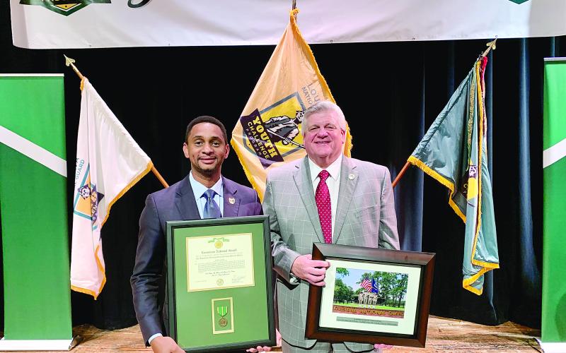 Brian Ardoin, community volunteer from Evangeline Parish, received the Louisiana Distinguished Civilian Service Medal on Saturday, May 28. He is pictured on the left with State Representative Lance Harris. (Gazette photo by Nancy Duplechain)