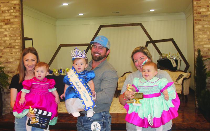 BABY MISS COURT - Shown, from left, are the members of the Baby Miss Boggy Bayou Court. They are Oaklee Beckham-Smith, first alternate, Queen Halle Chaddrick and Leacy Terro, second alternate.