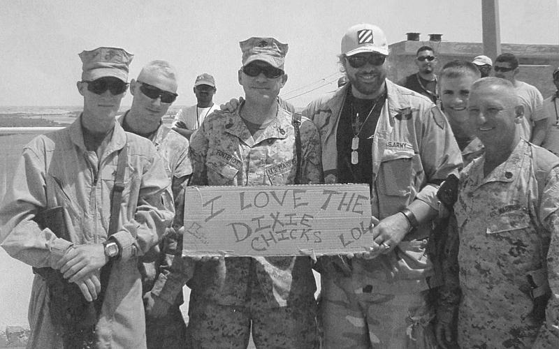 Basile’s Ben Fontenot (center) with Toby Keith (right) in Iraq in 2006.