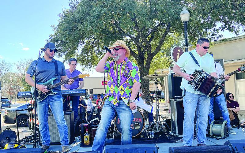 Pictured are Jamie Bergeron and the Kickin’ Cajuns as they perform at the corner of Main Street and Pine Street in Bastrop, Texas, on Saturday, February 3. (Gazette photo by Tony Marks)