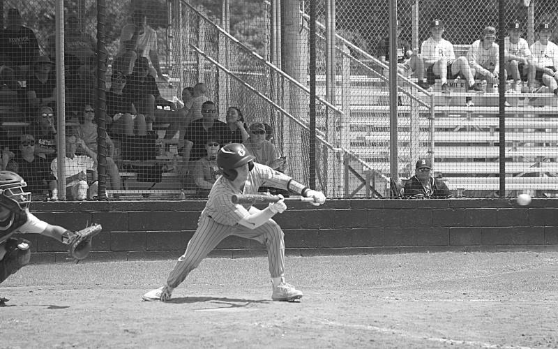 Logan Vidrine (17) attempts to lay down a bunt in Game 3 of the series against Berwick on Saturday. (Gazette photo by Tony Marks)