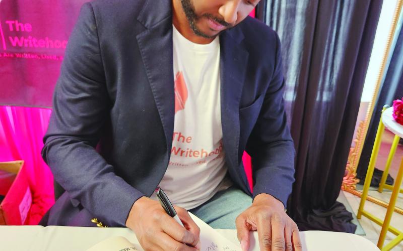 Book signing is held
