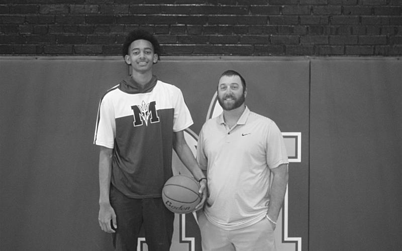 The 2026 Ville Platte Gazette’s Most Valuable Player and Coach of the Year for boys’ basketball represent Mamou High School. Above, left to right, are junior player Braxton Ardoin and head coach of the Green Demons J.B. Fontenot. Ardoin scored over 13 points per game this season and helped guide the team to a state semi-final appearance. (Gazette photo by Tony Marks)