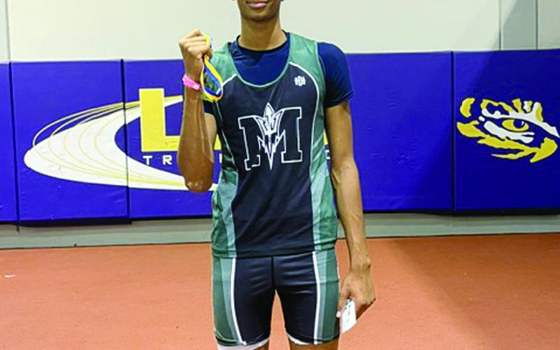 Braxton Ardoin, of Mamou High School, is pictured with his gold medal in Boys High Jump 3A. (Gazette photo by Tony Marks)