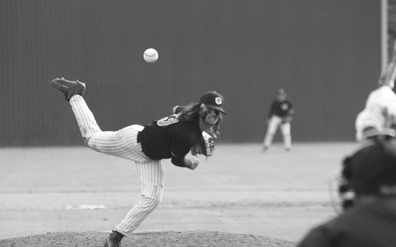 Pine Prairie starting pitcher Colin Ardoin (13) delivers a pitch against Sacred Heart in a 6-1 loss Tuesday afternoon. (Gazette photo by Rhett Manuel)
