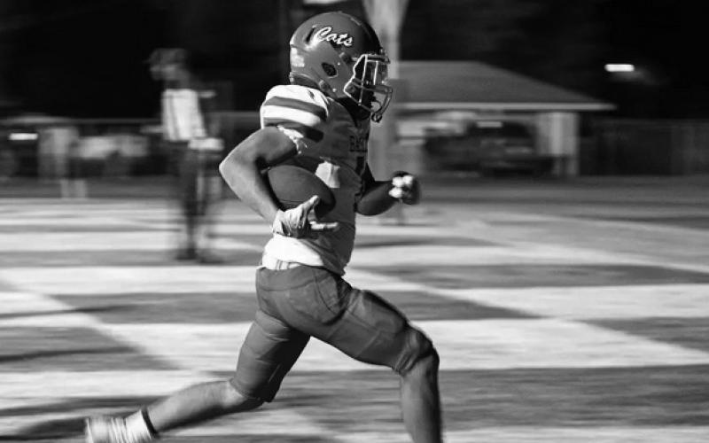 Basile’s Brian Hardy reaches the end zone for one of his two touchdowns against Ville Platte. (Photo by Tonya Ortego)